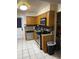 Efficient kitchen with stainless steel appliances, granite countertops, and ample cabinet space at 604 N Old Wire Rd, Wildwood, FL 34785