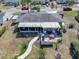 Charming single-Gathering home with screen patio, walkway, patio, and backyard at 616 Third Ave, Lady Lake, FL 32159