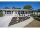 Charming single-story home featuring a brick accent and a welcoming landscaped front yard at 616 Third Ave, Lady Lake, FL 32159