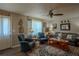 Cozy living room featuring hardwood floors, comfortable seating, and stylish decor at 616 Third Ave, Lady Lake, FL 32159
