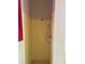 Standing shower stall with yellow tiling and a shower head at 619 W Seminole Ave, Eustis, FL 32726