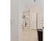 Bathroom with a glass-enclosed shower, light beige tile floor, and neutral paint at 704 Chelsea Ave, Fruitland Park, FL 34731