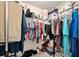 Walk-in closet with ample storage space and organizational features at 704 Chelsea Ave, Fruitland Park, FL 34731