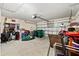 Spacious two-car garage featuring ample storage and a functional layout at 704 Chelsea Ave, Fruitland Park, FL 34731