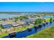 Waterfront community with private boat docks offering lake access and scenic views at 722 Barefoot Bay Loop, Groveland, FL 34736