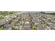 Expansive aerial view capturing a well-planned residential area with tree-lined streets and manicured lawns near a lake at 743 Brooks Field Drive Dr, Winter Garden, FL 34787