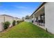 Large backyard with well-kept lawn, privacy fence and covered patio at 743 Brooks Field Drive Dr, Winter Garden, FL 34787