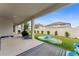 Backyard featuring a covered patio, play area, and well-maintained lawn at 743 Brooks Field Drive Dr, Winter Garden, FL 34787