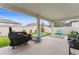 Wide backyard with covered patio and ample space for entertaining and playing at 743 Brooks Field Drive Dr, Winter Garden, FL 34787