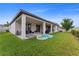 Spacious backyard with patio, lush green lawn, and privacy fence at 743 Brooks Field Drive Dr, Winter Garden, FL 34787