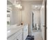 Bright bathroom with a double vanity and a view into the toilet and shower room at 743 Brooks Field Drive Dr, Winter Garden, FL 34787