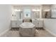 Spacious bathroom with double sinks, soaking tub, decorative tiling, and separate shower area at 743 Brooks Field Drive Dr, Winter Garden, FL 34787