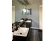 Bathroom with dual sinks, dark countertops, and decorative mirrors at 808 Chamberlain Loop, Lake Wales, FL 33853