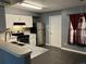 Bright kitchen with stainless steel appliances, tile backsplash, and tile flooring at 808 Chamberlain Loop, Lake Wales, FL 33853