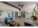 Charming patio with wicker furniture and serene decor, perfect for enjoying outdoor moments at 903 Belle Oak Dr, Leesburg, FL 34748