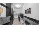Convenient laundry room with built-in storage, modern appliances, and stylish decor at 9134 Mossy Oak Ln, Clermont, FL 34711