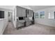 Spacious office area with built-in cabinetry, desk space, and natural light from windows at 9134 Mossy Oak Ln, Clermont, FL 34711