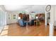 Spacious living room featuring high ceilings, clerestory windows, and extensive built-in shelving at 923 Oleander St, The Villages, FL 32159