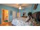 Bedroom view with entry to bathroom showing the blue bathmat at 971 Margaux Trl, The Villages, FL 32162