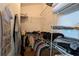 Walk-in closet with ample shelving and hanging storage for organized living at 971 Margaux Trl, The Villages, FL 32162