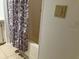 This bathroom has a shower with curtain at 1030 Vermont Ave, Lady Lake, FL 32159