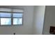 Bedroom with natural light from the windows at 1030 Vermont Ave, Lady Lake, FL 32159