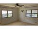 Bedroom with natural light from the windows at 1030 Vermont Ave, Lady Lake, FL 32159