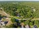 Overhead view of a large lot, surrounded by lush greenery, providing a private and serene environment at 111 Kentucky Blue Cir, Apopka, FL 32712