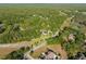 Aerial perspective of property's location with a view of surrounding ponds and green spaces at 111 Kentucky Blue Cir, Apopka, FL 32712