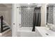Bathroom offers decorative tile accent wall, a shower and tub, and a single vanity at 111 Kentucky Blue Cir, Apopka, FL 32712