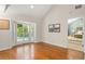 Bonus room with natural light, hardwood floors, and view of pool at 111 Kentucky Blue Cir, Apopka, FL 32712