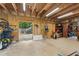 This garage with an open door gives access to the land and lots of storage at 111 Kentucky Blue Cir, Apopka, FL 32712