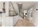 Hallway with built-in storage cabinets and an adjacent bathroom and bedroom at 111 Kentucky Blue Cir, Apopka, FL 32712