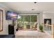 Cozy upstairs room featuring a sliding glass door that leads to a balcony at 111 Kentucky Blue Cir, Apopka, FL 32712