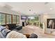 Spacious upstairs room with a view of a balcony and a comfortable seating area at 111 Kentucky Blue Cir, Apopka, FL 32712