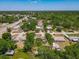 An aerial view of the property showcasing the tranquil neighborhood and lush green surroundings at 11114 Lake Eustis Dr, Leesburg, FL 34788