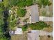 An aerial view of the backyard, featuring a dock on the canal at 11114 Lake Eustis Dr, Leesburg, FL 34788