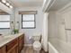 Functional bathroom with vanity, updated fixtures, and combined shower-tub at 11114 Lake Eustis Dr, Leesburg, FL 34788