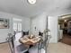 Eat in kitchen features tiled floor and access to both the garage and backyard at 11114 Lake Eustis Dr, Leesburg, FL 34788