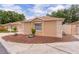 Side view of the home with well-maintained landscaping in a sunny neighborhood at 1121 Ricardo Ave, The Villages, FL 32159