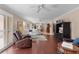 Large living room with hardwood floors and an open floor plan at 1121 Ricardo Ave, The Villages, FL 32159