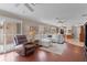 Spacious living room with plenty of seating and natural light at 1121 Ricardo Ave, The Villages, FL 32159