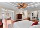 Expansive main bedroom with seating area, closet, and en-suite bathroom at 1121 Ricardo Ave, The Villages, FL 32159