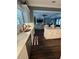 Bright, open-concept kitchen with modern appliances and a view into the stylish living room at 121 N Summit Ave, Lake Helen, FL 32744