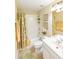 Bathroom with a tub and shower combination with decorative shower curtain at 1288 Grady Ln, Davenport, FL 33896