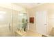 Tiled bathroom featuring a tiled shower and vanity area at 1288 Grady Ln, Davenport, FL 33896