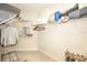 Walk-in closet featuring wire shelving and neutral carpet at 1288 Grady Ln, Davenport, FL 33896