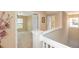 A bright hallway showing access to the rooms of the home at 1288 Grady Ln, Davenport, FL 33896