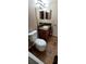 Bathroom featuring granite vanity and toilet with tile flooring at 14049 Fairway Island Dr # 118, Orlando, FL 32837