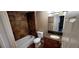 Bathroom featuring a shower and bath with updated fixtures, vanity with granite countertop at 14049 Fairway Island Dr # 118, Orlando, FL 32837